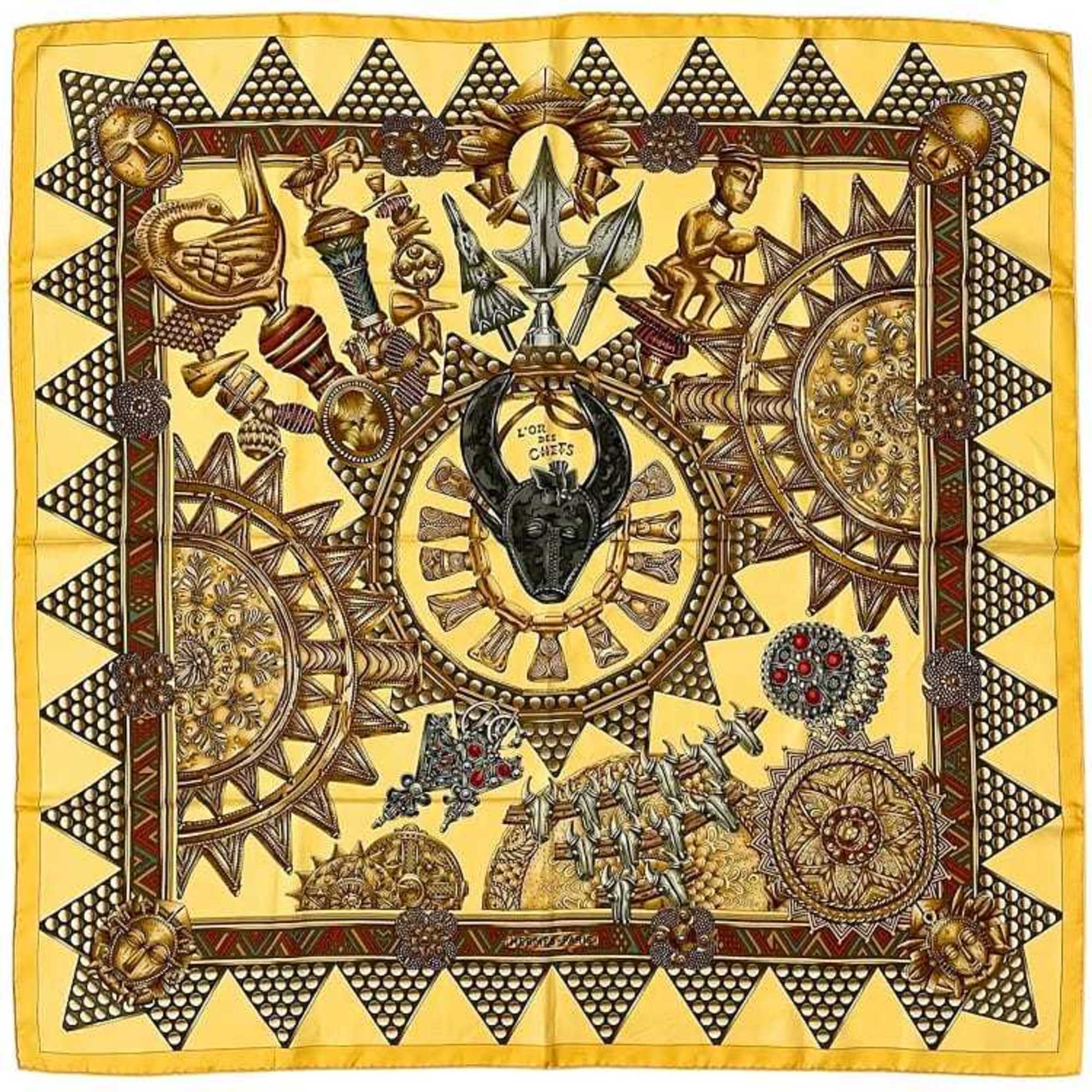Hermes HermÃ¨s CarrÃ© 90 Scarf (ec-23771) in Beige and Brown. Made of 100% Silk, “L’OR DES CHEFS” (The Chiefs’ Gold). A large, ethnic scarf from the collection.