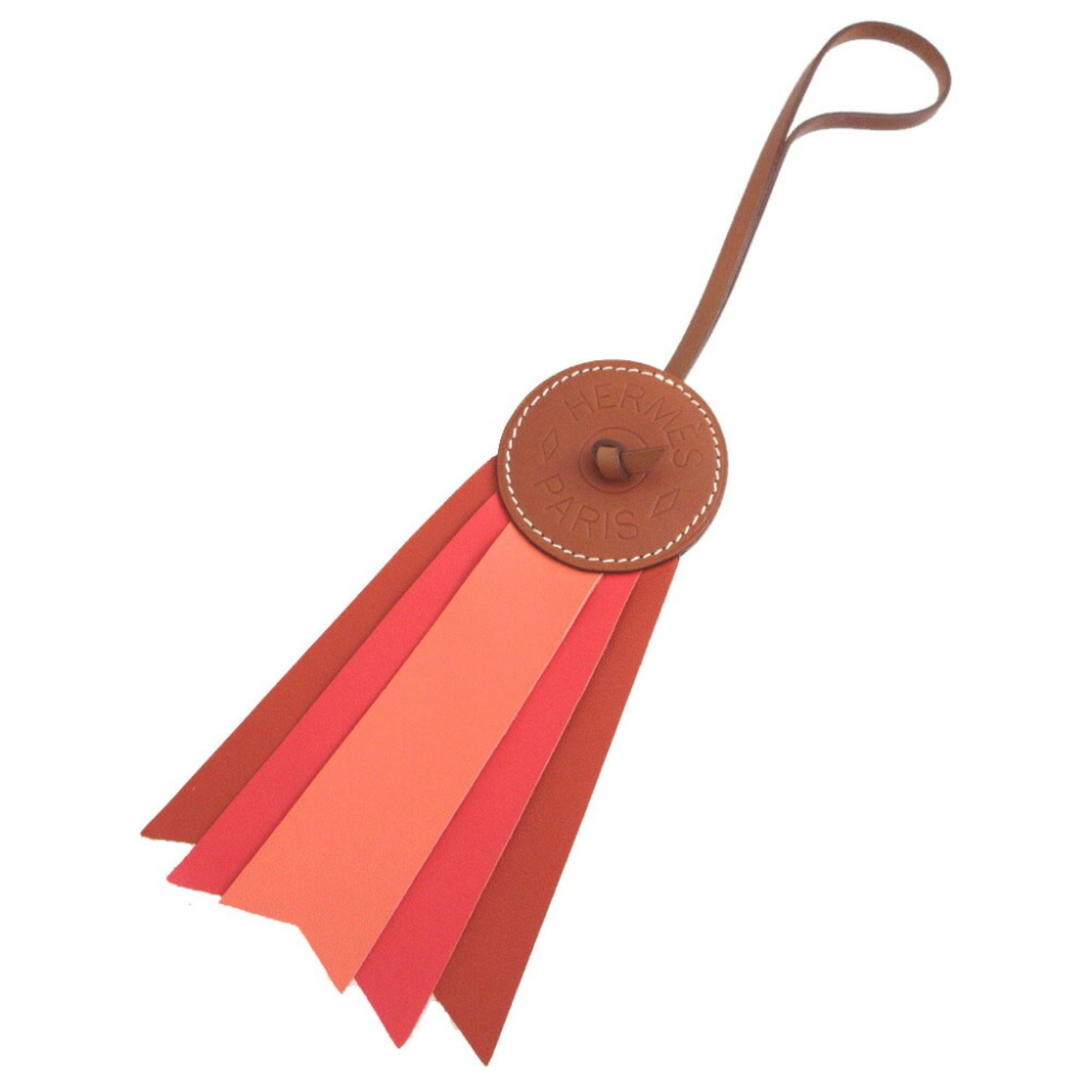 Unused Hermes 064271CA-AH Paddock Flotte Agneau Milo Vache Hunter Capucines Carnelian Charm Keychain 1086HERMES