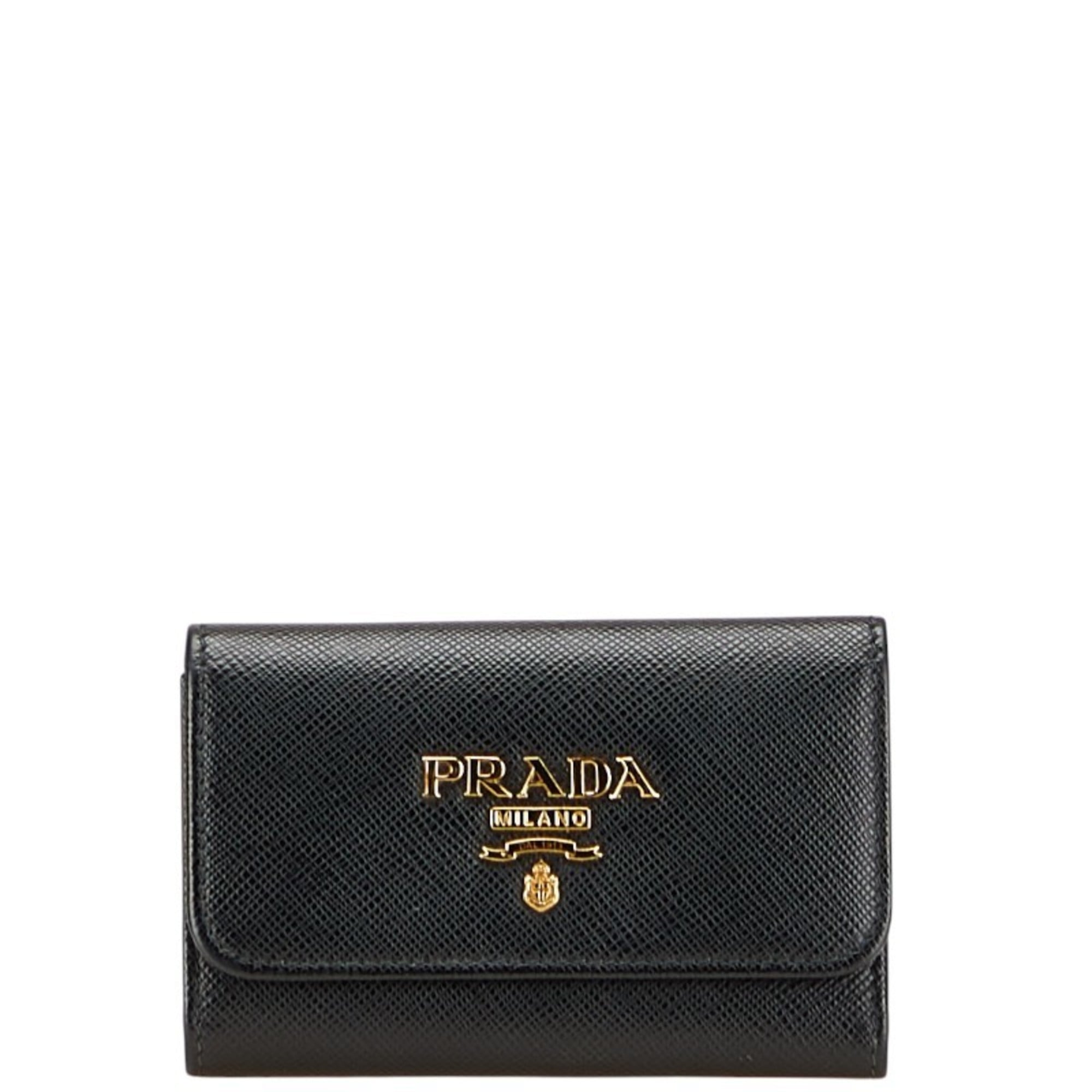 Prada 4-ring key case in black and gold leather for women