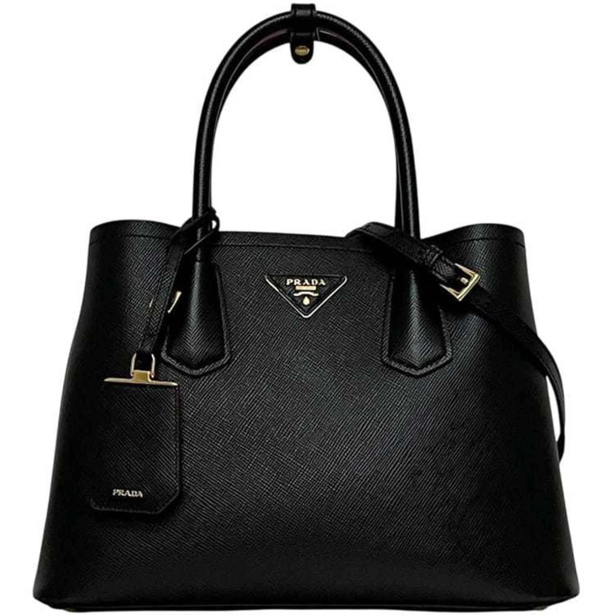 Prada 2-way bag f-24517 Black NERO 1BG887 Saffiano leather 117 F PRADA tote with triangular plate and self-standing hardware. Shoulder bag/crossbody in black. Suitable for men women.