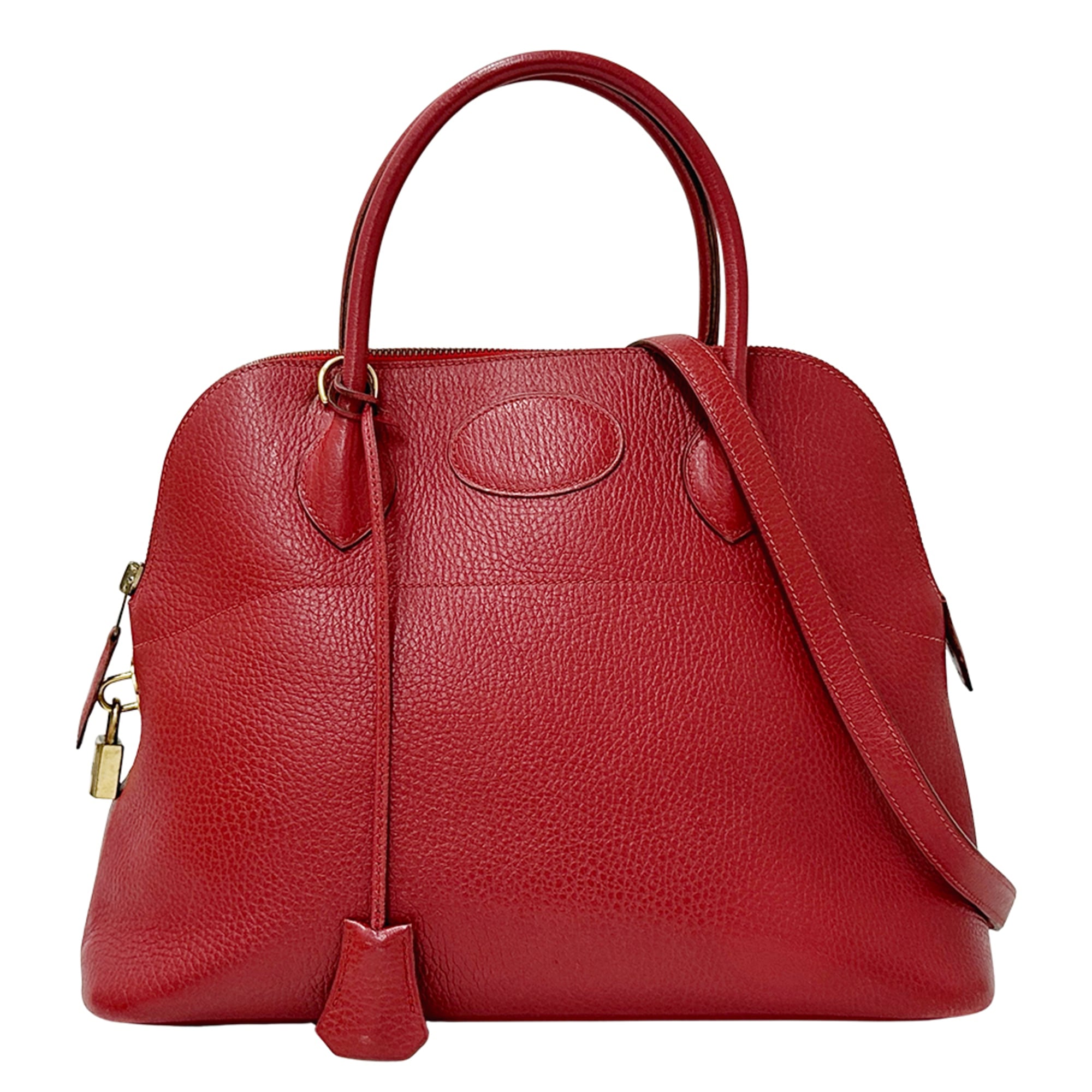 Hermes HermÃ¨s Bolide 31 Ardennes bag, a 2-way handbag/shoulder bag for women, in red with gold hardware.