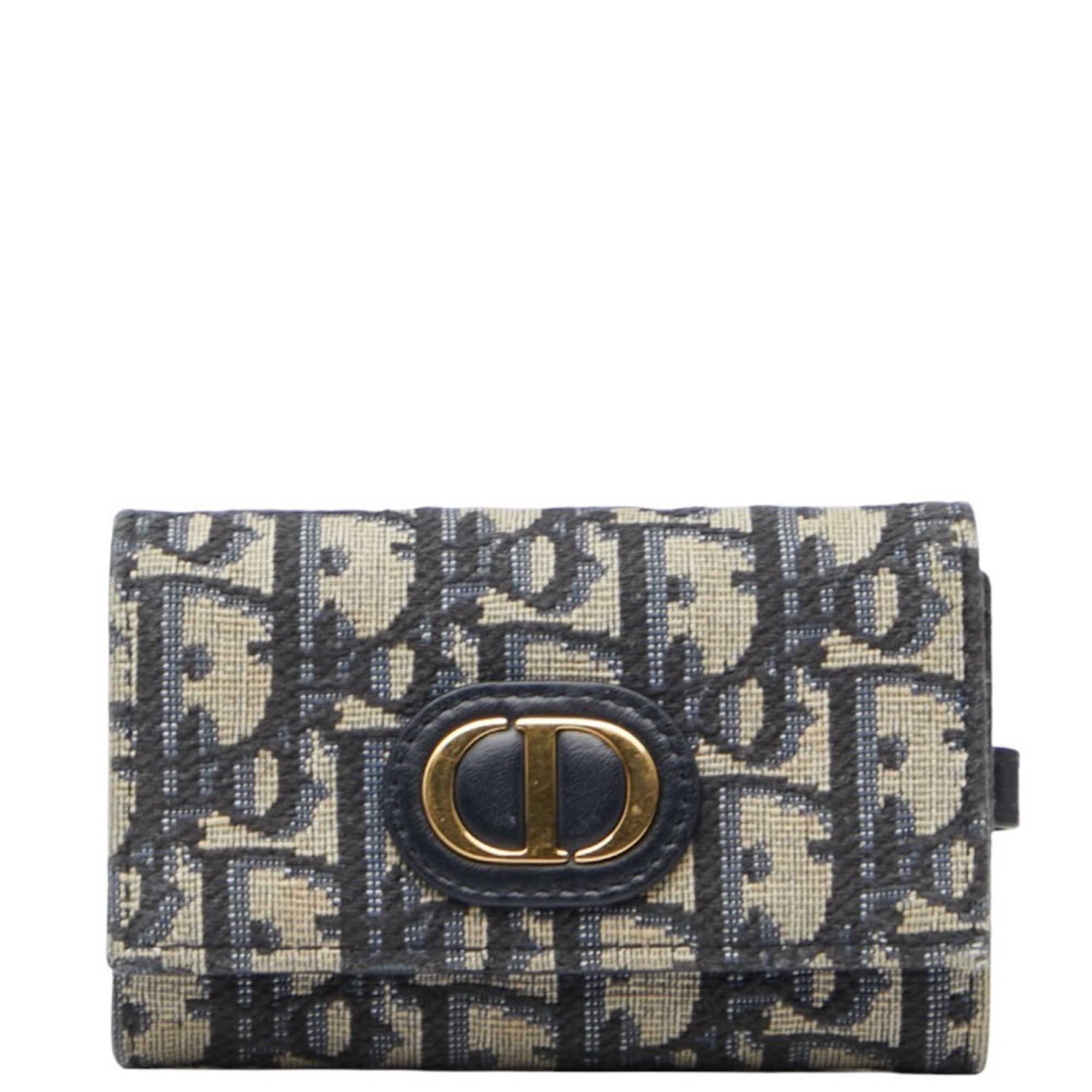 Christian Dior Dior Oblique 4-ring key case in beige and navy canvas leather. Women’s.