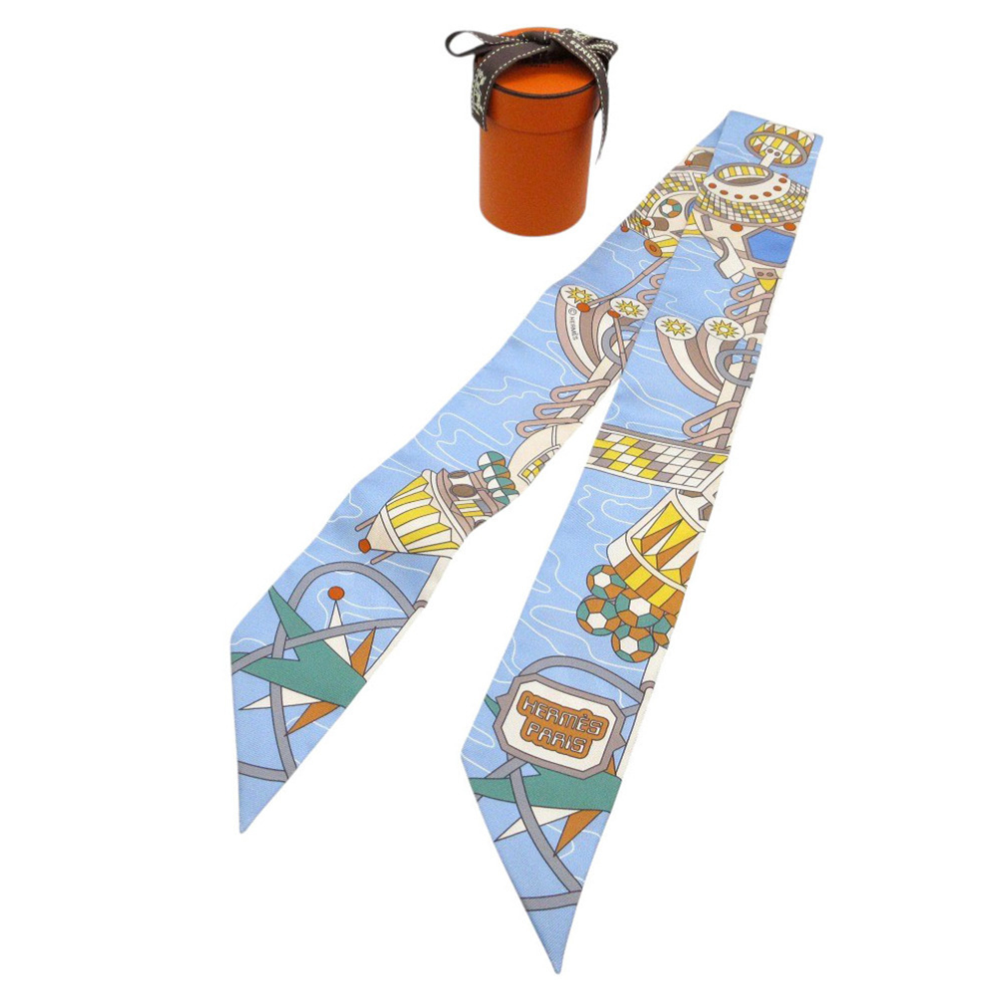 Hermes Like new HermÃ¨s Twilly Odyssey Scarf/Muffler in Silk, Beige/Blue Ciel/Jaune Vif, 0175.